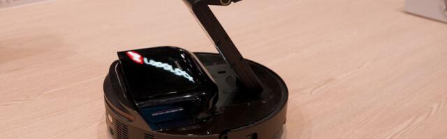 This robovac has an arm — and legs, too