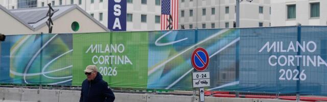 Athletes bring Milan Olympic Village to life, complete with Italian bidets and 4-story US banners