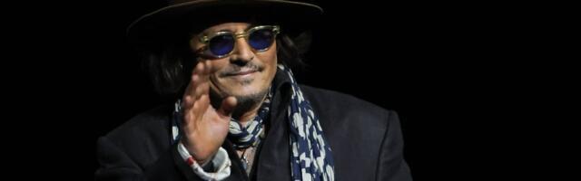 Bah, humbug: Johnny Depp wipes his grid for Ebenezer