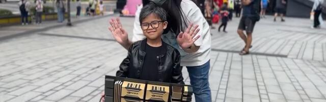 Mini-Jensen Huang cosplayer melts hearts wearing a massive Nvidia GPU for Halloween