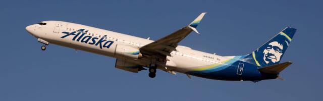 An Alaska Airlines passenger tried to force open an emergency exit at 39,000 feet, affidavit says