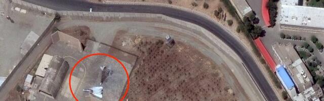 Satellite image of an Iranian airport shows an American-made F-14 Tomcat that Israel turned into a burned wreck