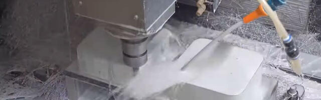 Mini-PC production line video shows a combination of machine automation and human efforts to make PCs