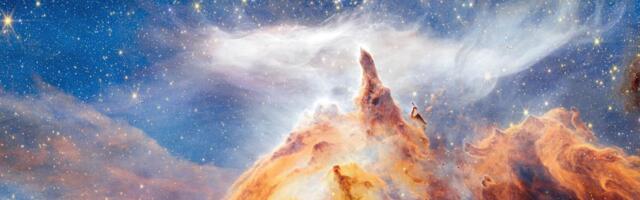 New Webb image shows star formation as glittering, craggy peaks