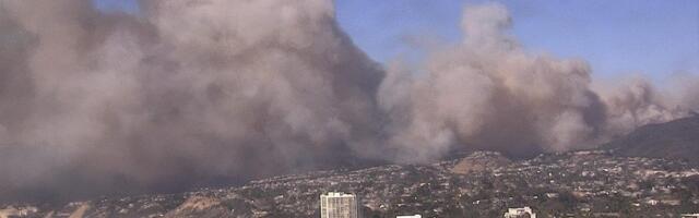 200-acre brush fire erupts in affluent Pacific Palisades neighborhood of Los Angeles, prompting mandatory evacuations