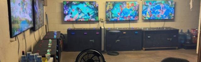 Honolulu police raid Kalihi illegal gambling room, arrest two suspects, seizing machines