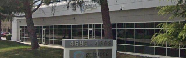 East Bay office building bought at price below its prior value