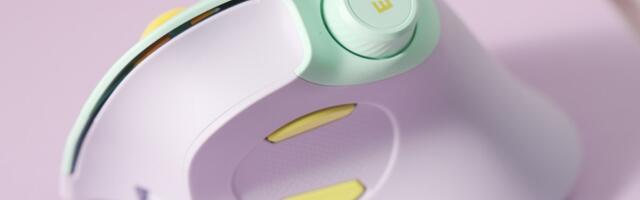 This vertical mouse includes a volume knob with playback controls