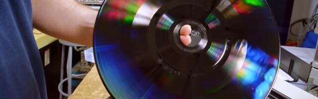 Microscopes can clearly see the video on  the surface of a LaserDisc, discovers Techtuber — a 12-inch vinyl-like disc that stores SD analog video