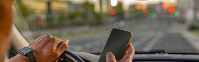 Is It Legal To Check Your Phone At A Red Light? Here's What CA Law Says
