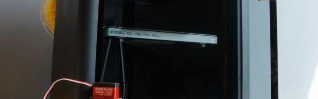 New auto ejection tool for Bambu Lab print farms automatically ejects finished 3D prints from the machine — $129 kit includes auto door opener and special bed surface for frictionless part ejection