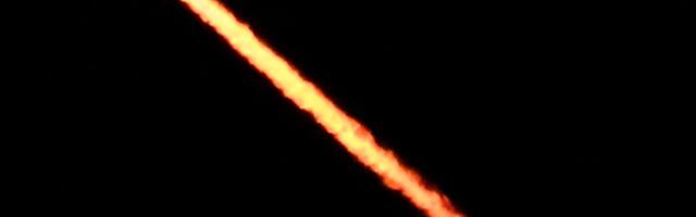 A SpaceX rocket arcs across the California sky, hurling internet satellites to the heavens