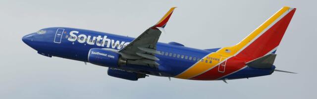 A Southwest plane had to abort its landing after a near miss with a helicopter crossing its path