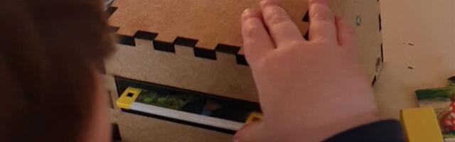 Floppy disk drive converted into smart TV remote for kids — dev’s toddler inserts vividly labeled floppies to watch his favorite shows