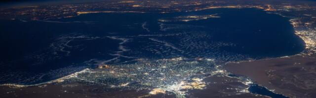 Departing ISS astronaut still finds time for stunning night shot