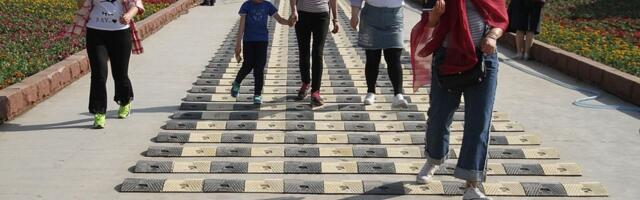 China Installed Pedestrian Speed Bumps On Certain Streets - And Here's Why