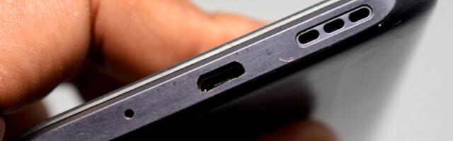 Here's Why Your Phone Has A Little Hole Next To The Charging Port