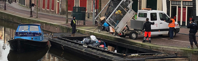 Amsterdam trials electric ‘trash boats’ to clean up its streets