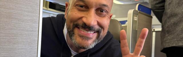 Someone asked to switch our business seats on a plane. I said yes, and got to take photos with one of my favorite celebrities.