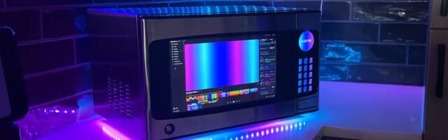 Microwave repurposed into slick custom All-in-One PC — door serves as display,  motherboard rotates on the turntable, and Stream Deck used for keypad