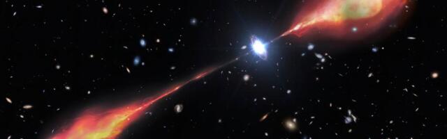 Telescopes spy a monster radio jet streaming from a bright and early object in the universe