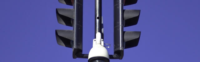 Those 'Bells' On Top Of Traffic Lights? They're Actually Cameras