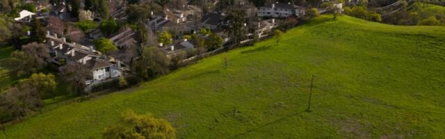 Thousands of seniors want to live on the 30 acres of Seven Hills Ranch. A 50-square-foot strip of land has been holding it up for months.