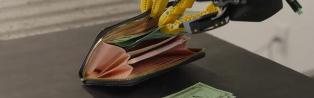 Watch a Robot Stuff Cash Into a Wallet Just Like You Do