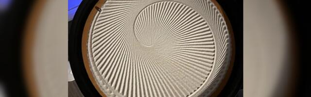 Raspberry Pi Dune Weaver table draws images in sand using magnets