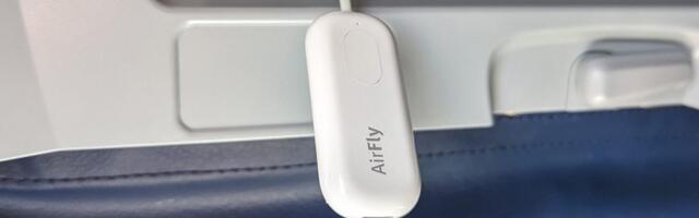 I Never Fly Without This Genius Bluetooth Dongle. Here's Why