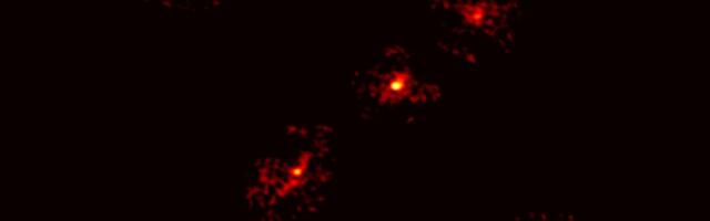 Unprecedented ‘Einstein Cross’ Reveals Fifth Ghost Image and a Dark Matter Surprise