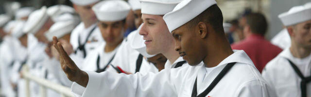 Why Does The Crew On A Navy Ship Line The Deck While Leaving Port?