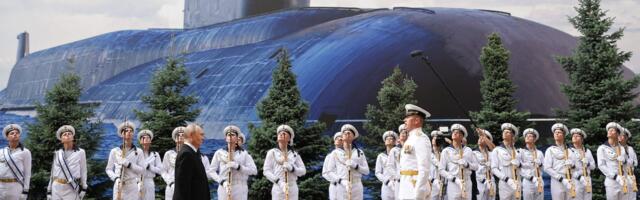 Russia replaced its once-grand Navy Day parade with a shipless event and a giant poster of a submarine