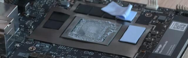 Framework Desktop's Noctua fan and Cooler Master heatsink pried off, Strix Halo exposed