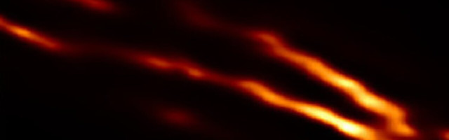 Here’s a badass picture of plasma jets shooting out of a supermassive black hole