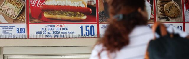Costco's CEO chows down on a $1.50 hot dog combo in the latest riff on the McDonald's burger meme