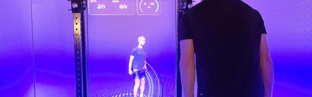 'This just knows so much more than a human ever could': Meet CoachCube, the intelligent AI personal trainer that lives inside a Tron-style box room
