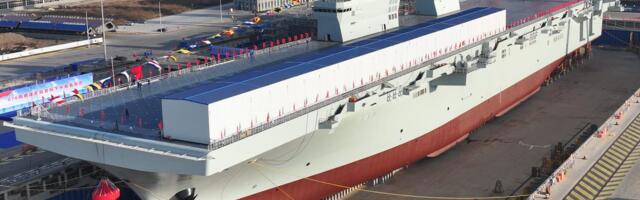 See aboard China's new massive assault ship that can launch fighter jets or drones