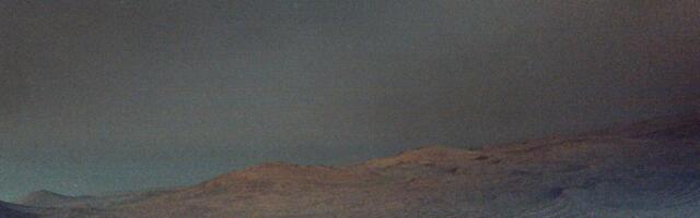 NASA rover shares moody image of Mars moon Deimos