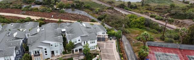 Homeowner fined $1.4 million by Coastal Commission opens gate to California beach and lagoon