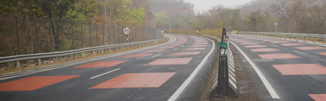 This 'Red Road' Is Designed To Slow Down Drivers And Protect Wild Life