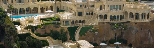 A late tech billionaire's Versailles-inspired California mansion just took a $20 million price cut to $87.5 million. See inside.