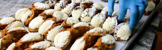Inside a family-owned Brooklyn bakery where they've been hand rolling cannoli the same way for 50 years