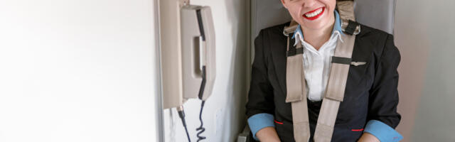 Why Flight Attendants Have Cross-Body Seatbelts (But Passengers Don't)