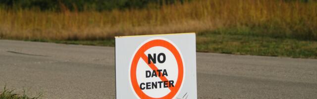 Teacher arrested for clapping in support of opposition at an AI data center meeting — gigawatt-scale project gets approved anyway despite community resistance