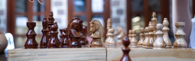 You Can Play Chess in Hyperbolic Space Now, and It Sucks