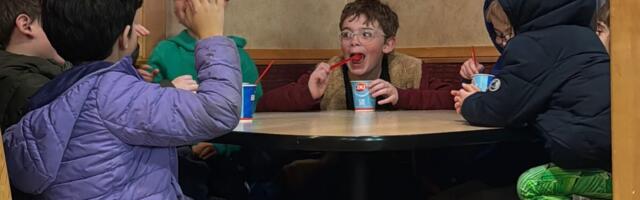 My 8-year-old invited his 4 best friends for dinner. I sat at a separate table and watched them have fun independently.