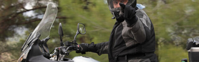 What It Means When You See Motorcyclists Point Up Toward The Sky
