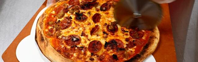 Elon Musk and OpenAI posture over pizza as the AI talent war heats up