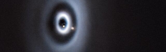 A solar system is forming right before our telescopes